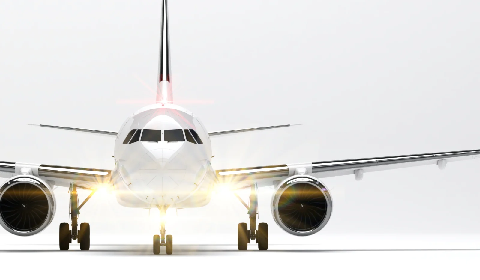 Airbus A320neo blanc vu de face, train d&rsquo;atterrissage sorti et feux allum&eacute;s.